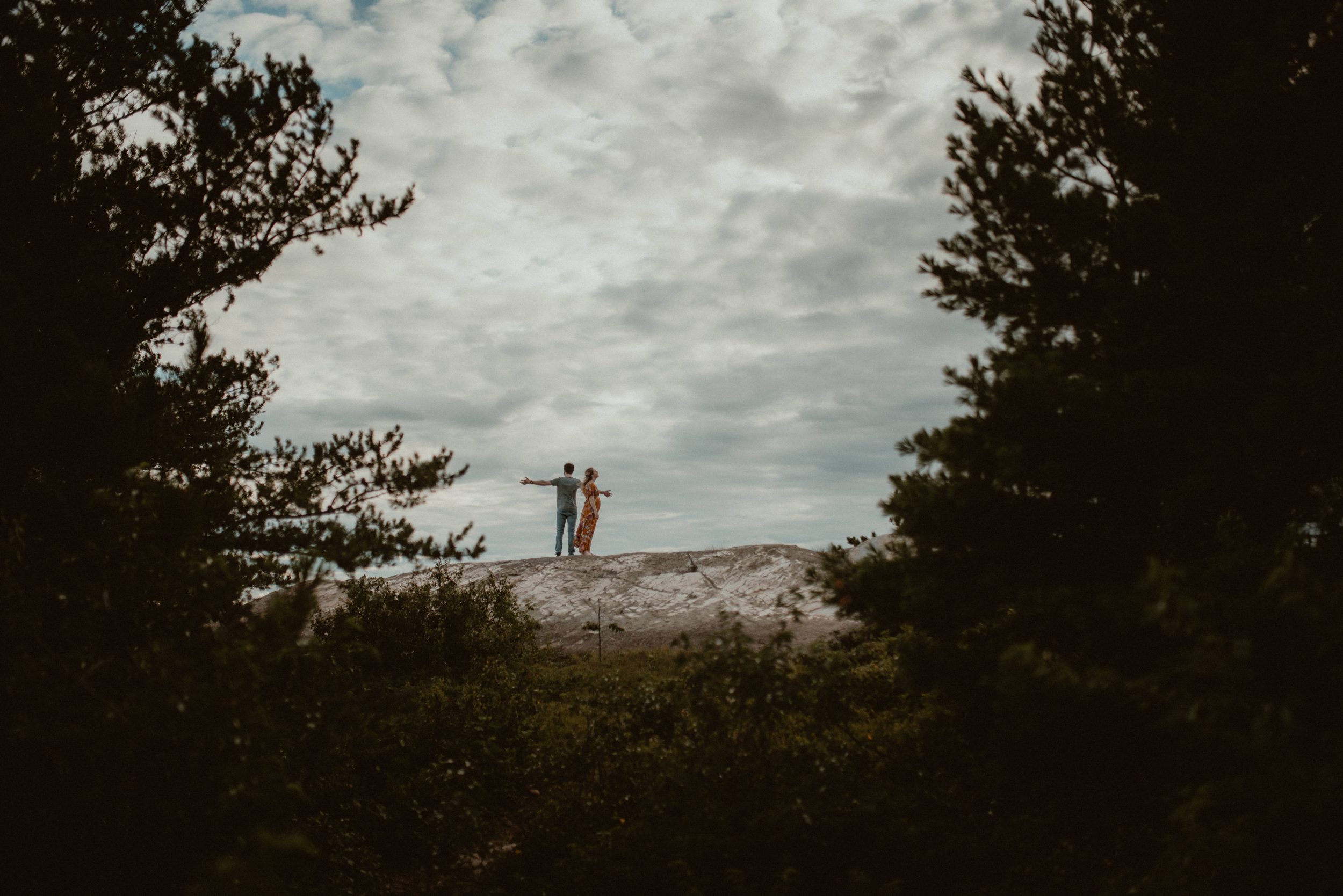 Couple at the top of Hogback Mountain in Marquette