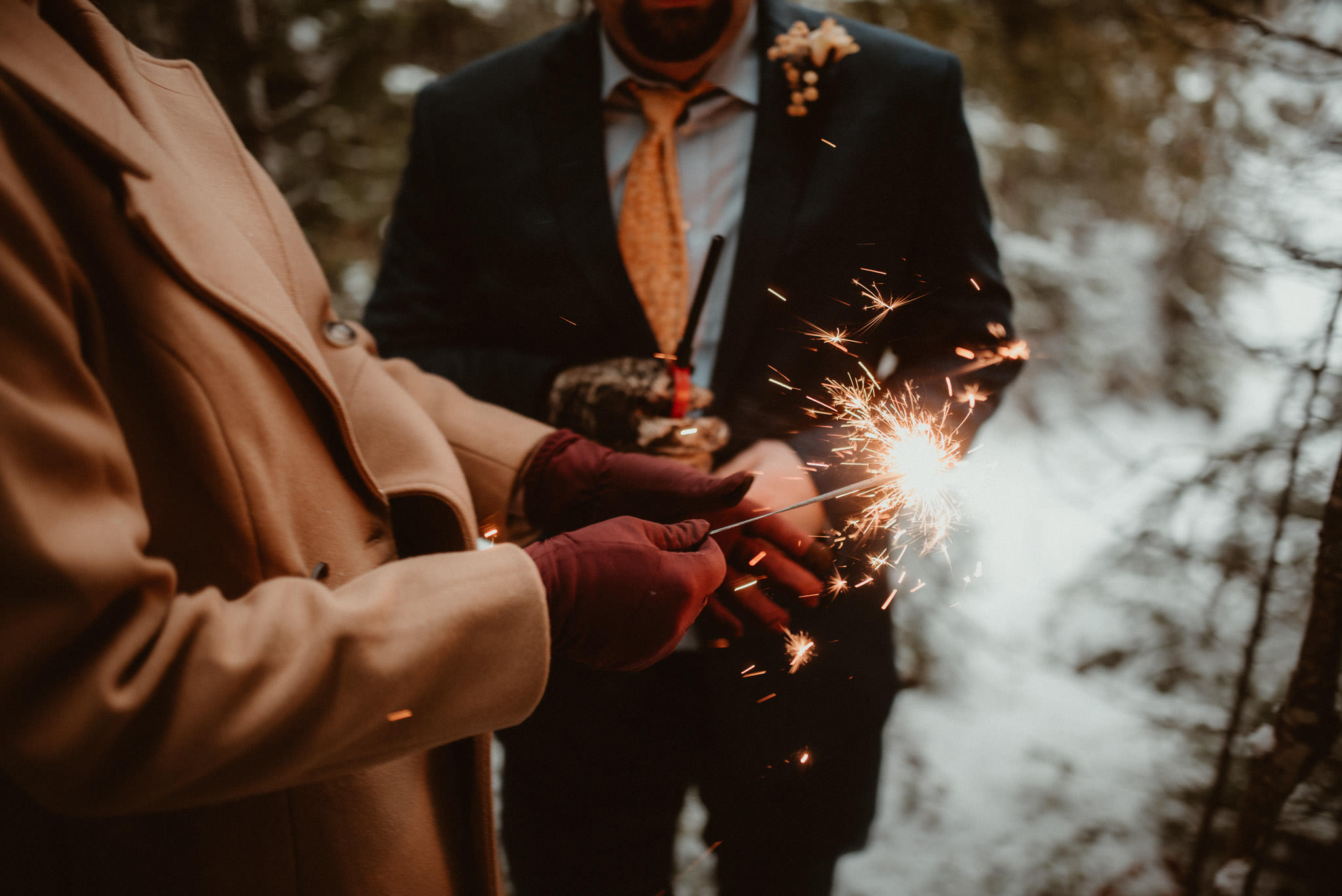 Sparkler photos at a winter elopement in Michigan