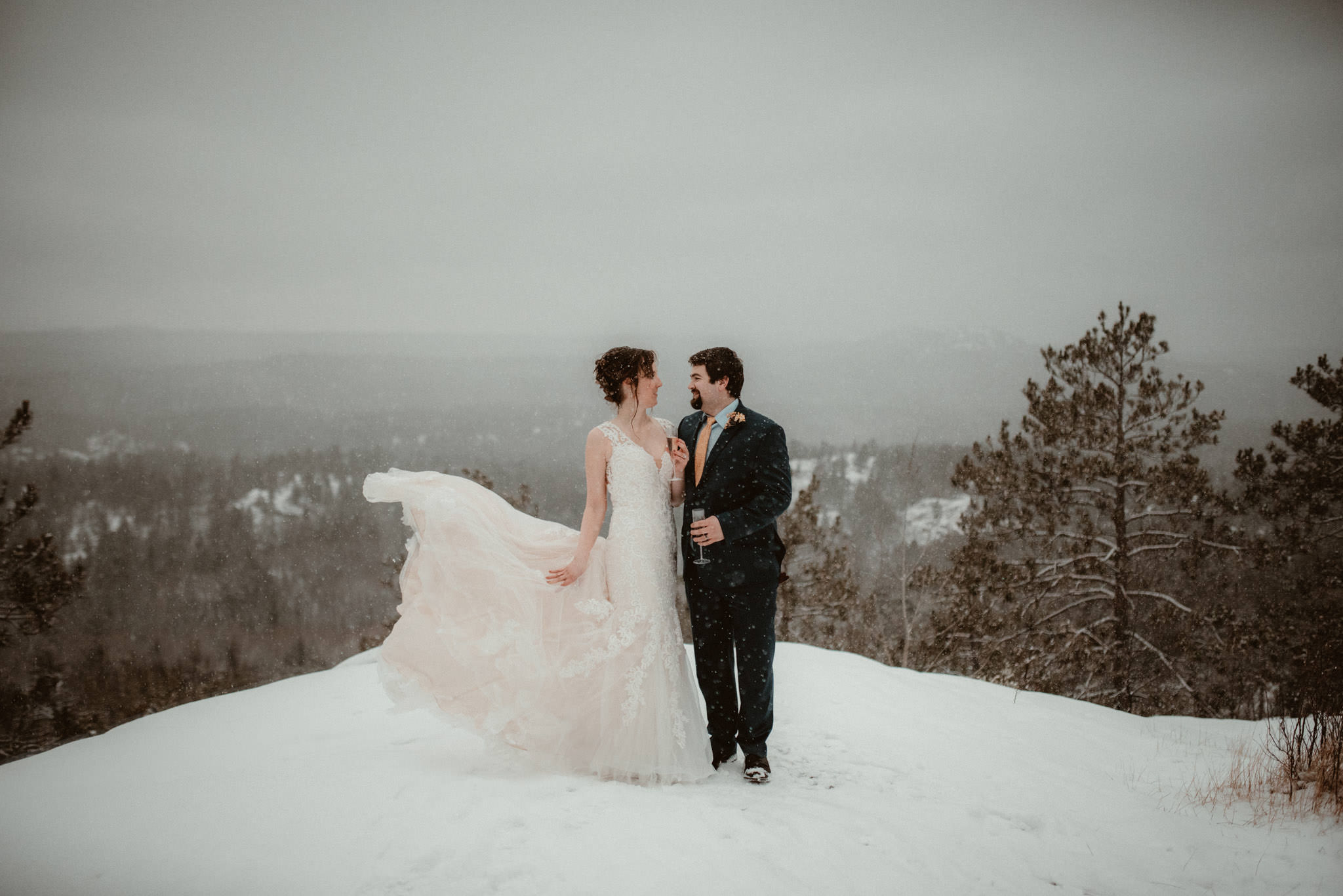 Elopement on Sugarloaf Mountain in Michigan in the snow